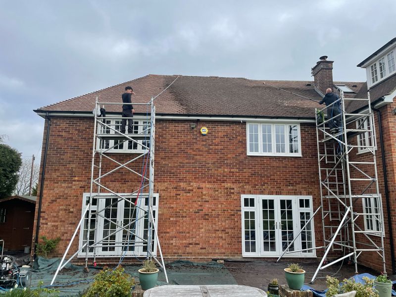 Roof cleaning carried out safely from scaffold towers by The Roof Moss Cleaners in Shipston-on-Stour
